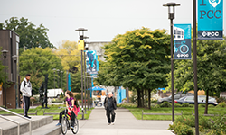 Students walking and biking at the Cascade campus.